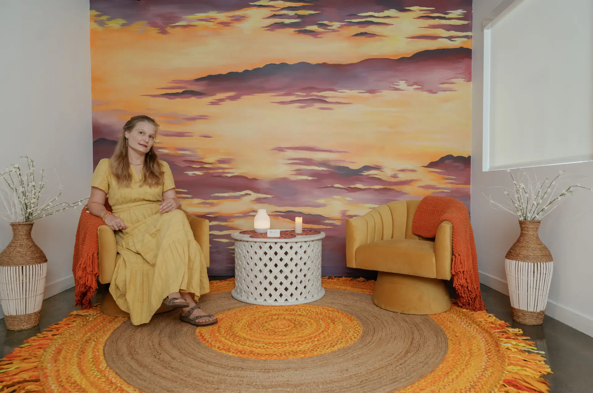 The Lucent Healing studio with sunset mural